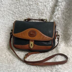 Vintage Dooney & Bourke leather Black &tan shoulder bag gold tone hardwares